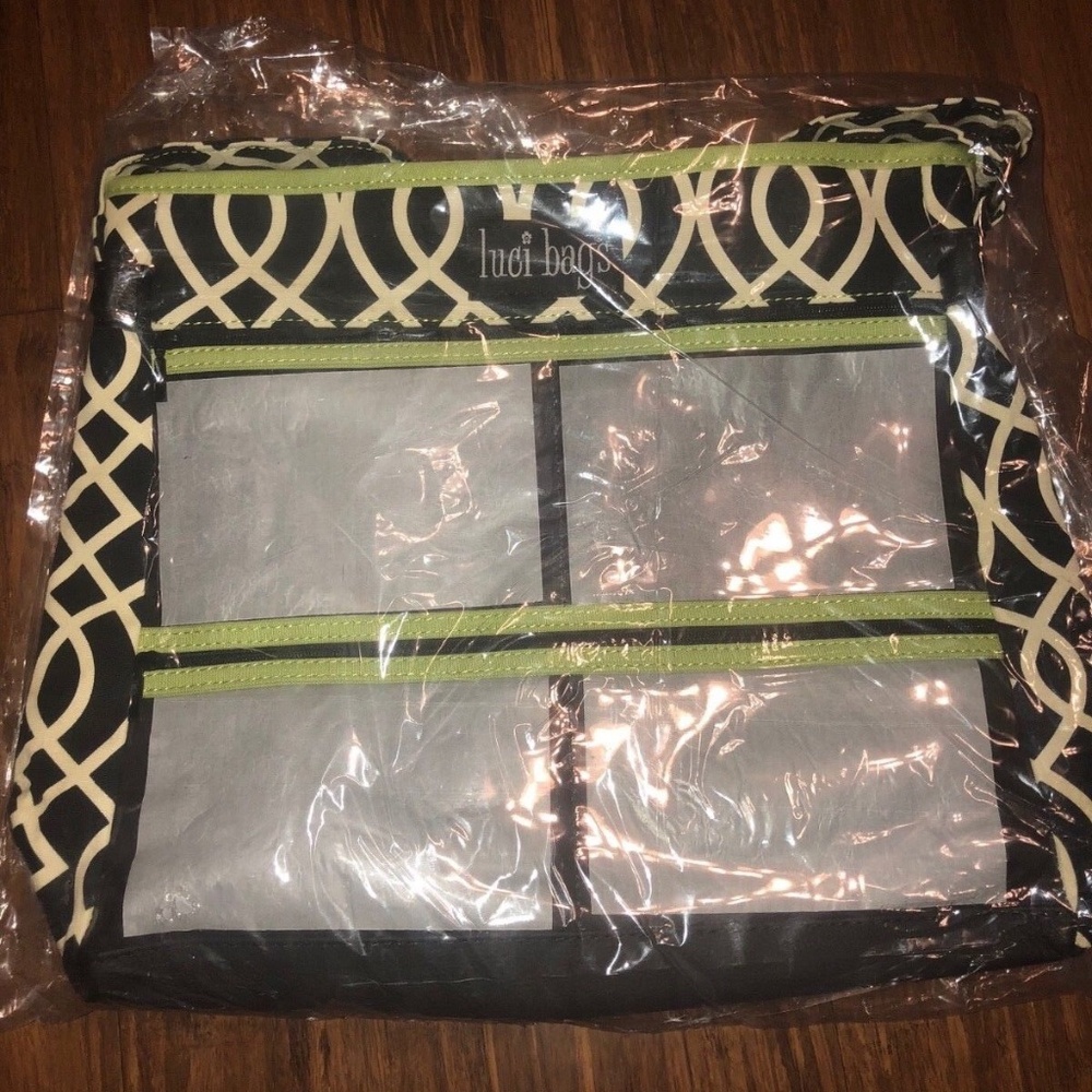 Brand new Luci bags purse. Crossbody display tote. Black Lattice. Discontinued.